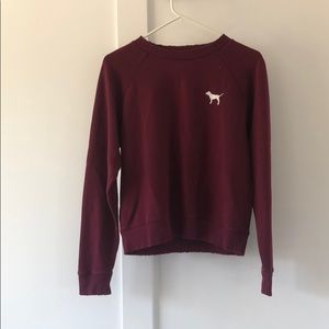 Two pink sweatshirts